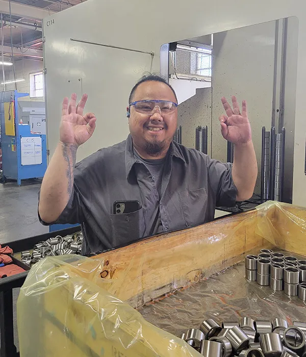 smiling team member working in the factory